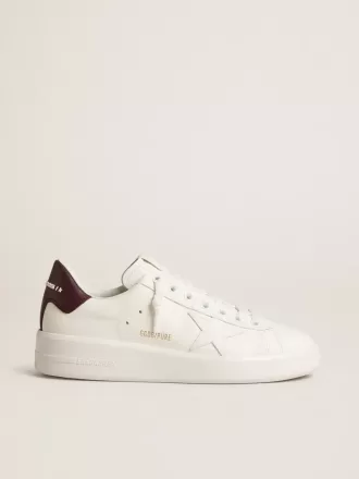 Purestar con estrella de cuero blanco y lengüeta del talón de cuero ciruela