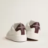 Purestar con estrella de cuero blanco y lengüeta del talón de cuero ciruela
