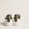Purestar para hombre con estrella de piel blanca y lengüeta verde oscuro en el talón