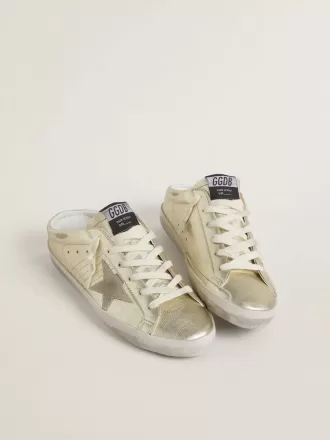 Sabots Super-Star en piel platino metalizada con estrella de ante beige