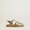 Sandalias Junior Maxime en piel metalizada dorada Sandalias Junior Maxime en piel metalizada dorada