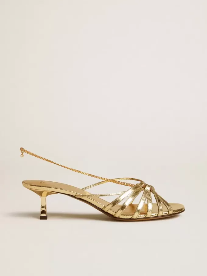 Sandalias Nico con tacón bajo en piel metalizada dorada Sandalias Nico con tacón bajo en piel metalizada dorada