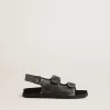 Sandalias Noa Junior en piel negra desgastada Sandalias Noa Junior en piel negra desgastada