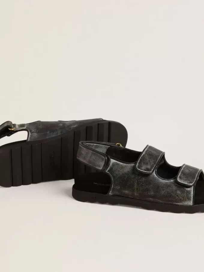 Sandalias Noa Junior en piel negra desgastada Sandalias Noa Junior en piel negra desgastada