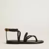 Sandalias planas Penelope para mujer en piel negra.