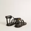 Sandalias planas Penelope para mujer en piel negra.