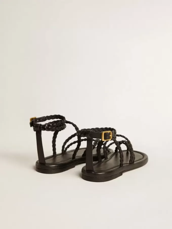 Sandalias planas Penelope para mujer en piel negra.