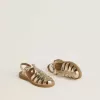 Sandalias Young Maxime en piel metalizada dorada Sandalias Young Maxime en piel metalizada dorada