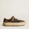 Space-Star para mujer en piel de potro con estampado de leopardo y estrella negra Space-Star para mujer en piel de potro con estampado de leopardo y estrella negra