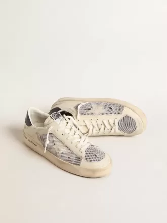 Stardan en piel blanca y malla con estrella de piel blanca.