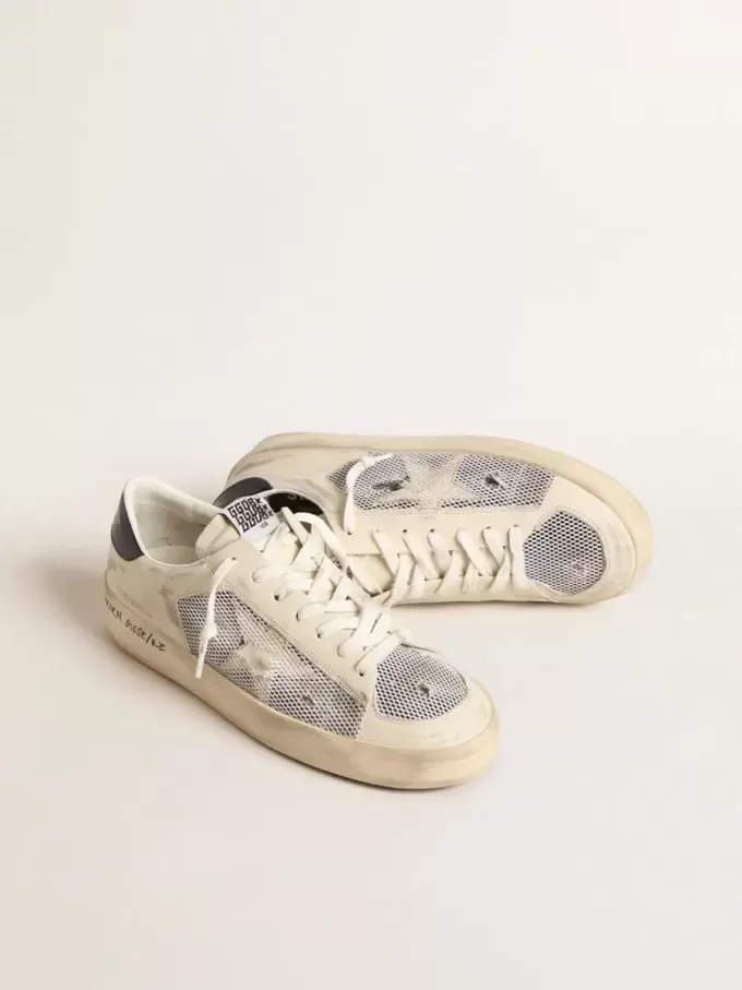 Stardan en piel blanca y malla con estrella de piel blanca. Stardan en piel blanca y malla con estrella de piel blanca.