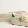 Stardan en piel napa blanca con estrella de piel color crema Stardan en piel napa blanca con estrella de piel color crema