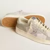 Stardan en piel napa gris y malla blanca con estrella de piel gris