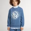 Sudadera azul para niños con parches blancos en relieve