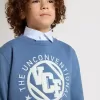 Sudadera azul para niños con parches blancos en relieve