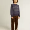 Sudadera azul violeta con las letras Golden Goose en la parte delantera