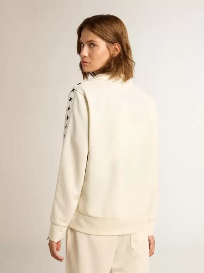 Sudadera blanca con cremallera para mujer con franja blanca y estrellas negras Sudadera blanca con cremallera para mujer con franja blanca y estrellas negras