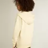 Sudadera con capucha en blanco desgastado con bordado dorado en la parte delantera.