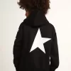 Sudadera con capucha para niño en color negro con estrellas blancas en contraste.