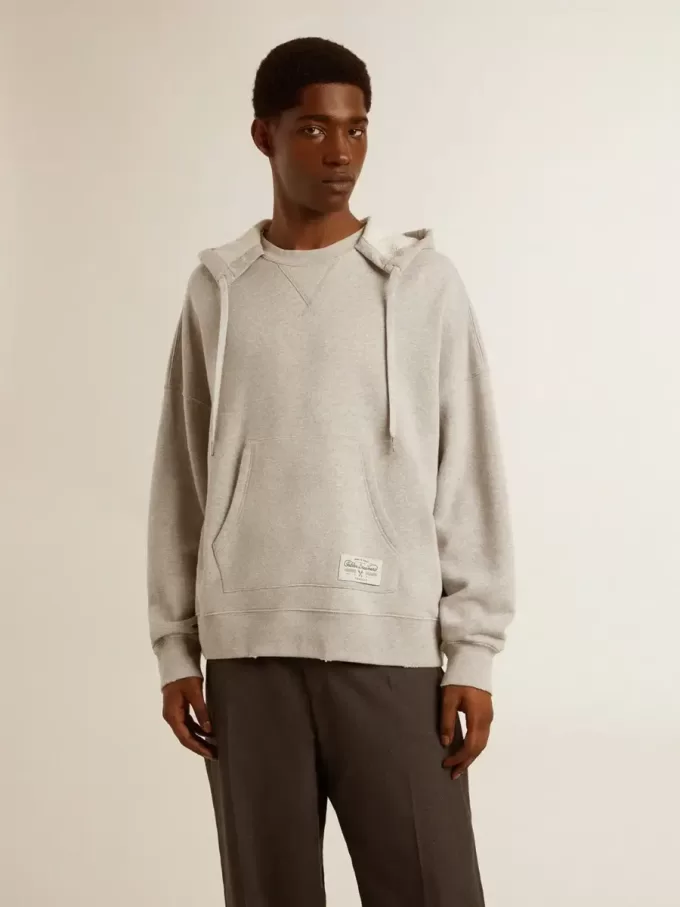 Sudadera con capucha unisex de algodón con estampado en la espalda. Sudadera con capucha unisex de algodón con estampado en la espalda.