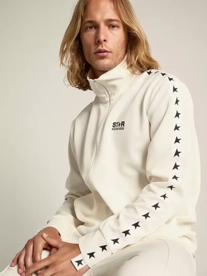 Sudadera con cremallera para hombre en color blanco papiro con estrellas negras Sudadera con cremallera para hombre en color blanco papiro con estrellas negras