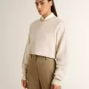 Sudadera corta de algodón color crema para mujer con cristales en la parte delantera Sudadera corta de algodón color crema para mujer con cristales en la parte delantera