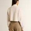 Sudadera corta de algodón color crema para mujer con cristales en la parte delantera Sudadera corta de algodón color crema para mujer con cristales en la parte delantera