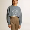 Sudadera corta en azul celeste con acabado desgastado Sudadera corta en azul celeste con acabado desgastado