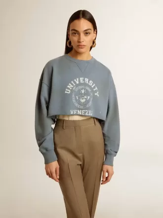 Sudadera corta en azul celeste con acabado desgastado