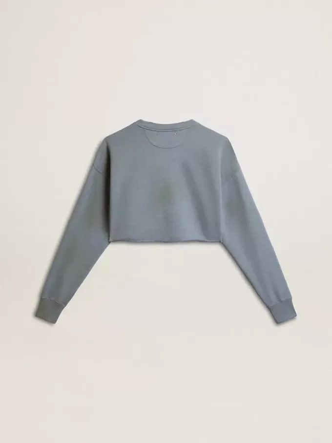 Sudadera corta en azul celeste con acabado desgastado Sudadera corta en azul celeste con acabado desgastado