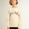 Sudadera en blanco desgastado con letras doradas multicolores en la parte delantera Sudadera en blanco desgastado con letras doradas multicolores en la parte delantera