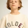 Sudadera en blanco desgastado con letras doradas multicolores en la parte delantera Sudadera en blanco desgastado con letras doradas multicolores en la parte delantera