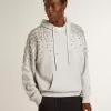 Sudadera gris con capucha y adornos de cristales Sudadera gris con capucha y adornos de cristales