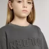Sudadera gris para niños con logotipo en relieve Sudadera gris para niños con logotipo en relieve