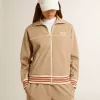 Sudadera ligera beige con cremallera y logotipo blanco para mujer Sudadera ligera beige con cremallera y logotipo blanco para mujer