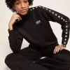 Sudadera negra con cremallera y estrellas blancas para mujer Sudadera negra con cremallera y estrellas blancas para mujer