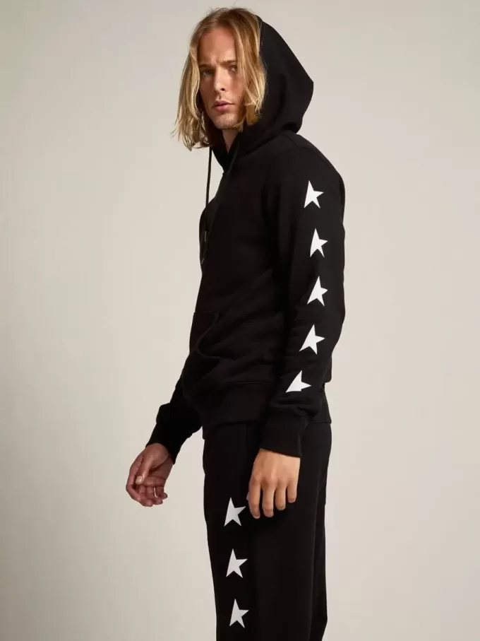 Sudadera negra de la colección Alighiero Star con estrellas blancas en contraste. Sudadera negra de la colección Alighiero Star con estrellas blancas en contraste.