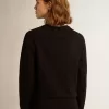 Sudadera negra de la colección Athena Star con estrella tono sobre tono en la parte delantera. Sudadera negra de la colección Athena Star con estrella tono sobre tono en la parte delantera.