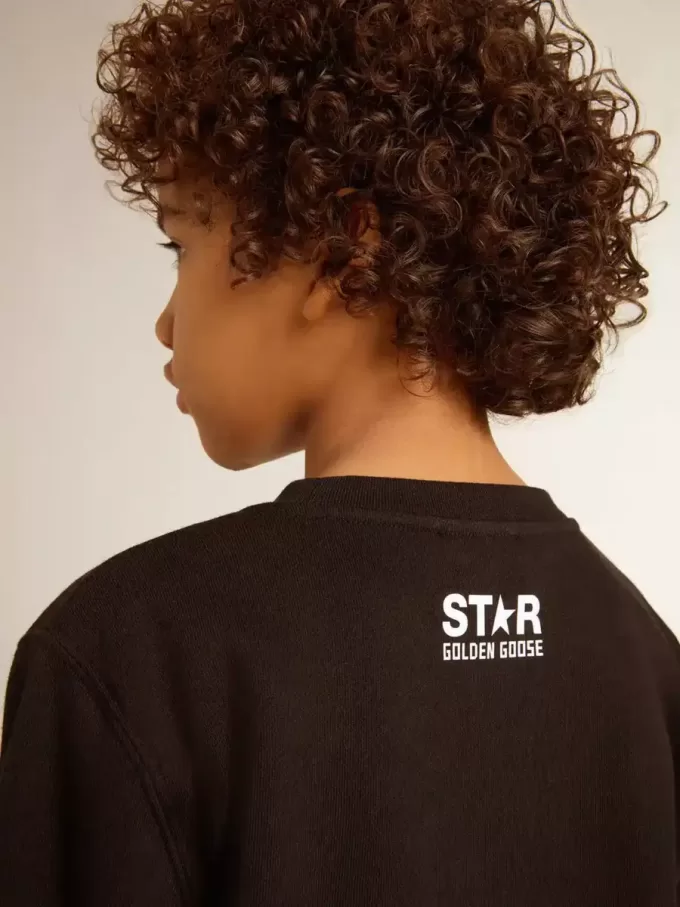 Sudadera negra para niño con una estrella maxi blanca en la parte delantera