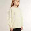 Sudadera para niña en color crema con letras bordadas Sudadera para niña en color crema con letras bordadas