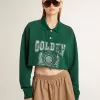 Sudadera polo corta verde para mujer con estampado Sudadera polo corta verde para mujer con estampado