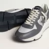 Suela de running para hombre en nailon gris y piel napa negra con estrella de ante negro. Suela de running para hombre en nailon gris y piel napa negra con estrella de ante negro.