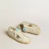 Super-Star en piel y ante blancos con estrella de piel plateada y dorada Super-Star en piel y ante blancos con estrella de piel plateada y dorada