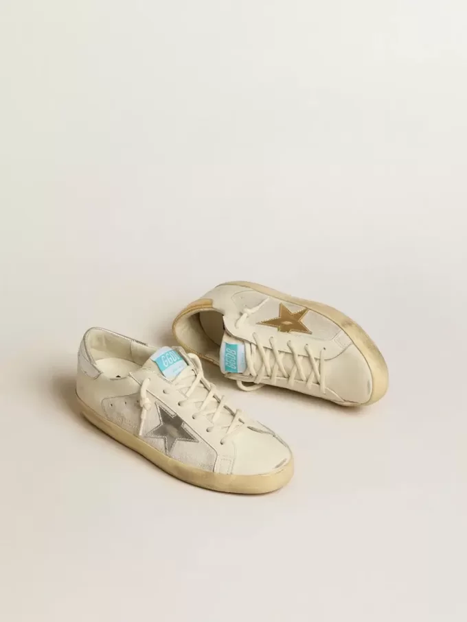 Super-Star en piel y ante blancos con estrella de piel plateada y dorada Super-Star en piel y ante blancos con estrella de piel plateada y dorada