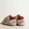 Super-Star Junior con estrella de ante y lengüeta de cuero rojo en el talón
