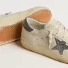 Super-Star LTD con estrella de cuero color crema con cristales Swarovski y lengüeta del talón de cuero azul con estampado de lagarto Super-Star LTD con estrella de cuero color crema con cristales Swarovski y lengüeta del talón de cuero azul con estampado de lagarto