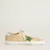 Super-Star LTD en piel beige con estrella de ante verde y lengüeta del talón en piel plateada metalizada Super-Star LTD en piel beige con estrella de ante verde y lengüeta del talón en piel plateada metalizada