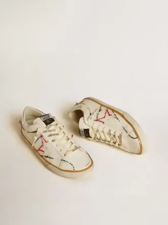 Super-Star LTD para hombre con estrella perforada y lengüeta metálica en el talón.