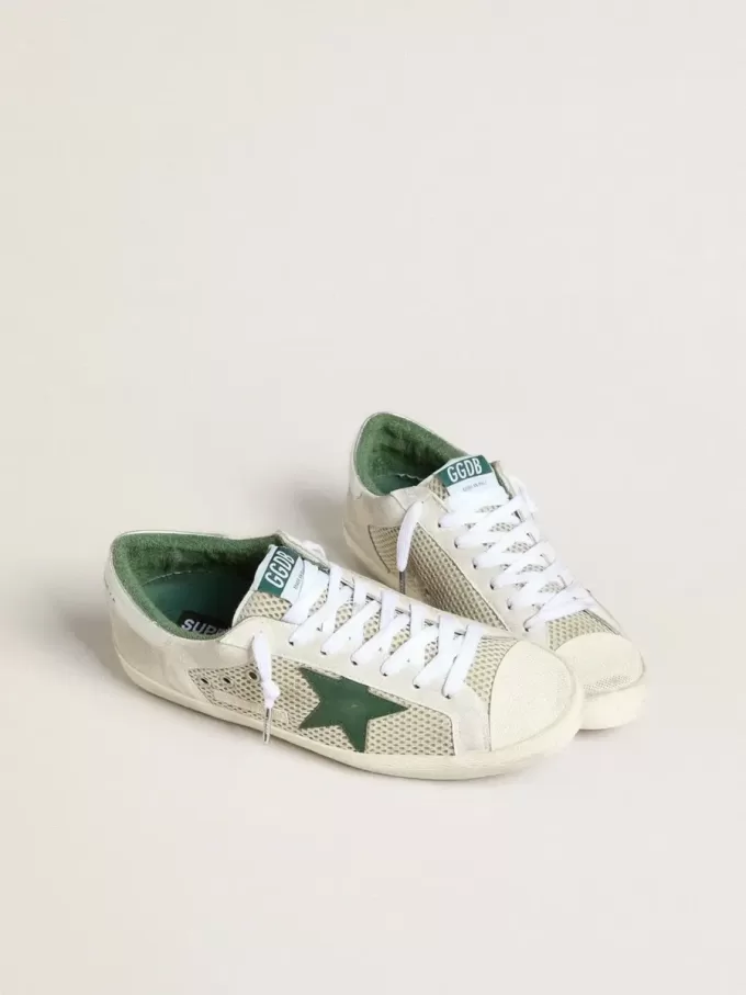 Super-Star LTD para hombre en ante blanco y malla con estrella de piel verde y lengüeta plateada en el talón Super-Star LTD para hombre en ante blanco y malla con estrella de piel verde y lengüeta plateada en el talón