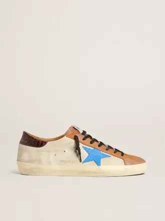 Super-Star LTD para hombre en color beige con estrella azul claro y lengüeta con estampado de cocodrilo en el talón Super-Star LTD para hombre en color beige con estrella azul claro y lengüeta con estampado de cocodrilo en el talón